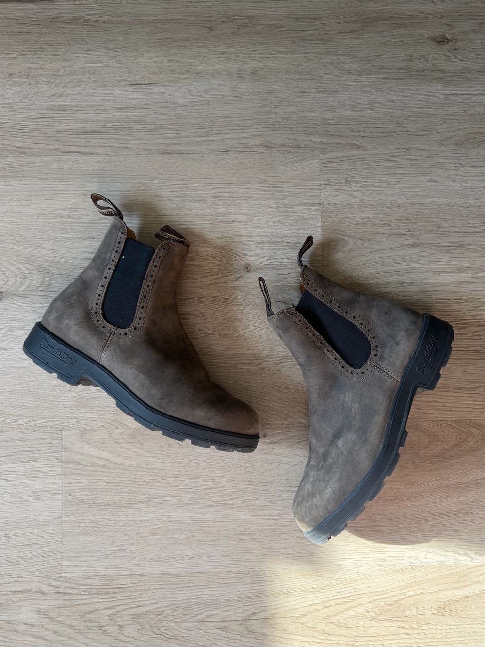 Rustic brown high top blundstone boots